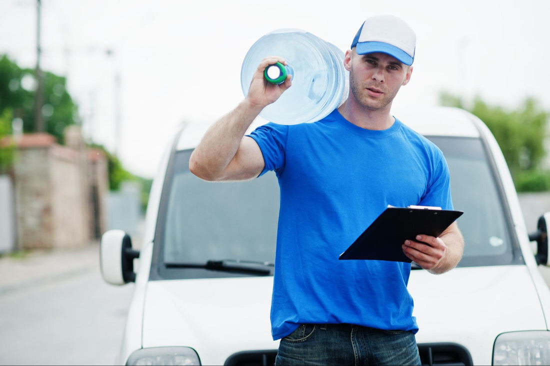 Guy with a clipboard delivering water